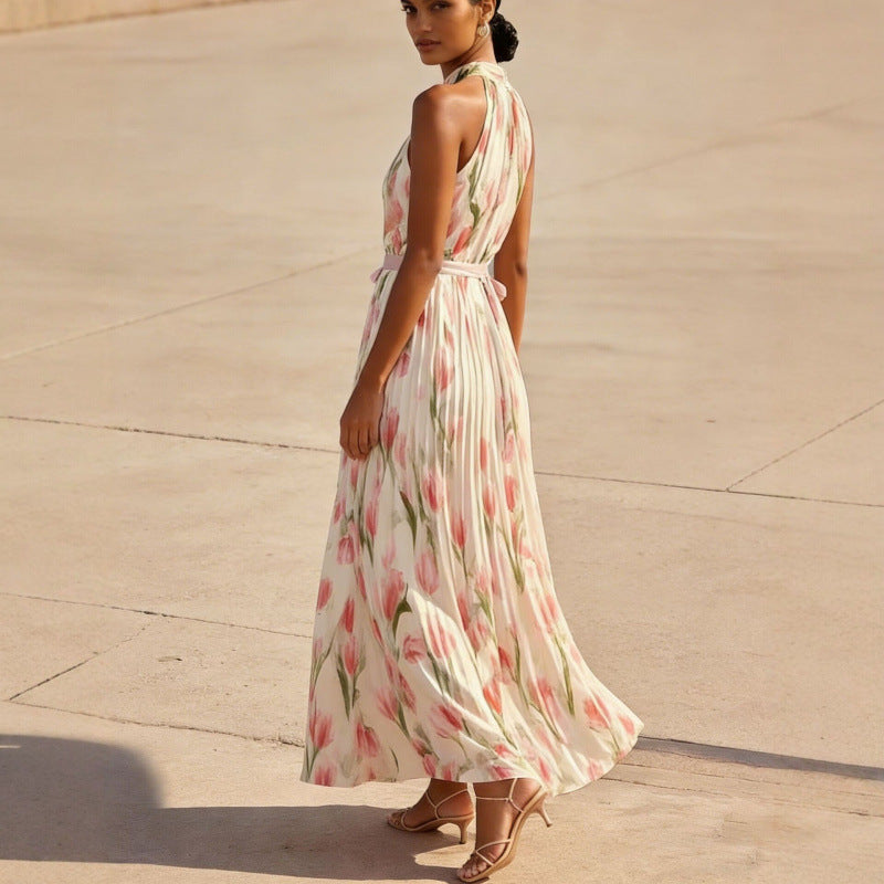 Women's halterneck high-waist swing dress by FitiqueFit featuring floral and solid print casualwear, shown with a flowing skirt.