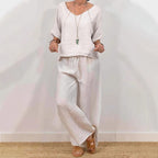 Women’s multi-color two-piece casualwear set with V-neck top and pants by Plush Fashion Hub, shown in a stylish, relaxed fit.