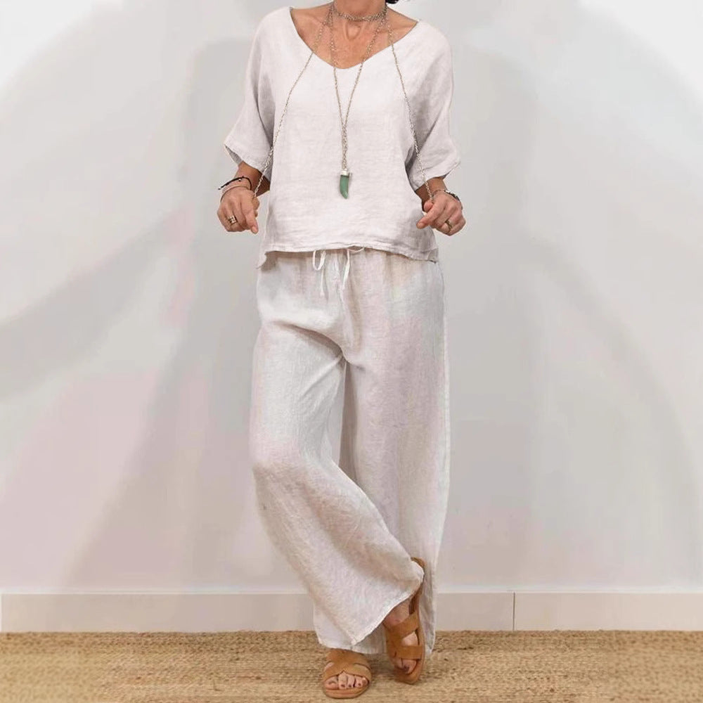 Women’s multi-color two-piece casualwear set with V-neck top and pants by Plush Fashion Hub, shown in a stylish, relaxed fit.