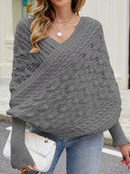 Cable knit batwing sleeve sweater by Trendsi, showing the cozy, textured knit fabric and relaxed fit design.