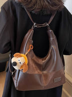 Vintage-inspired PU leather slouchy hobo shoulder bag with a relaxed design, perfect for casual and stylish everyday use.