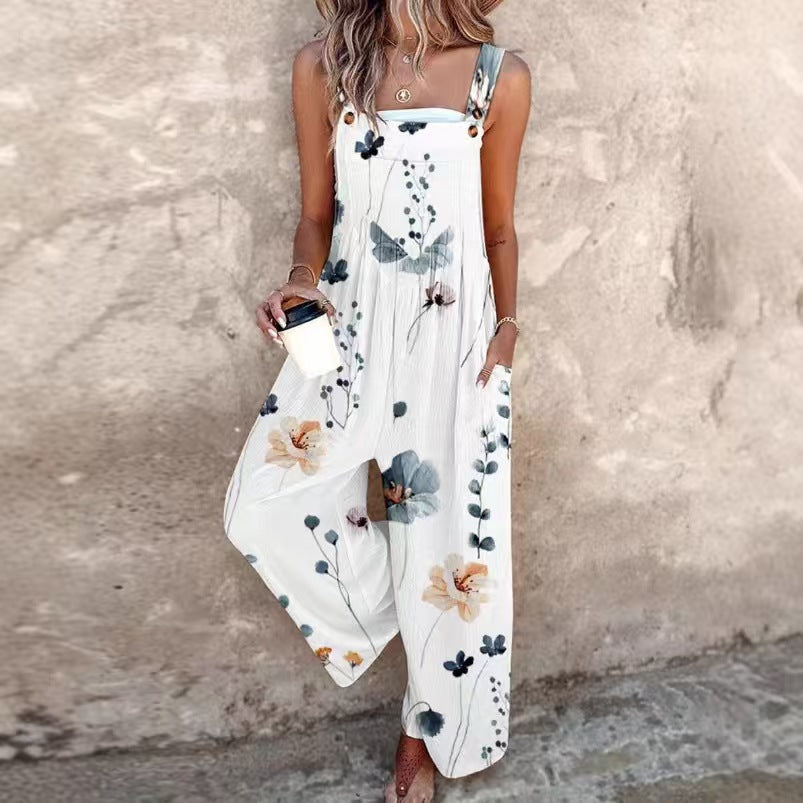 Women’s floral square-neck sleeveless jumpsuit by FitiqueFit, casualwear with a fitted waist and vibrant floral pattern.