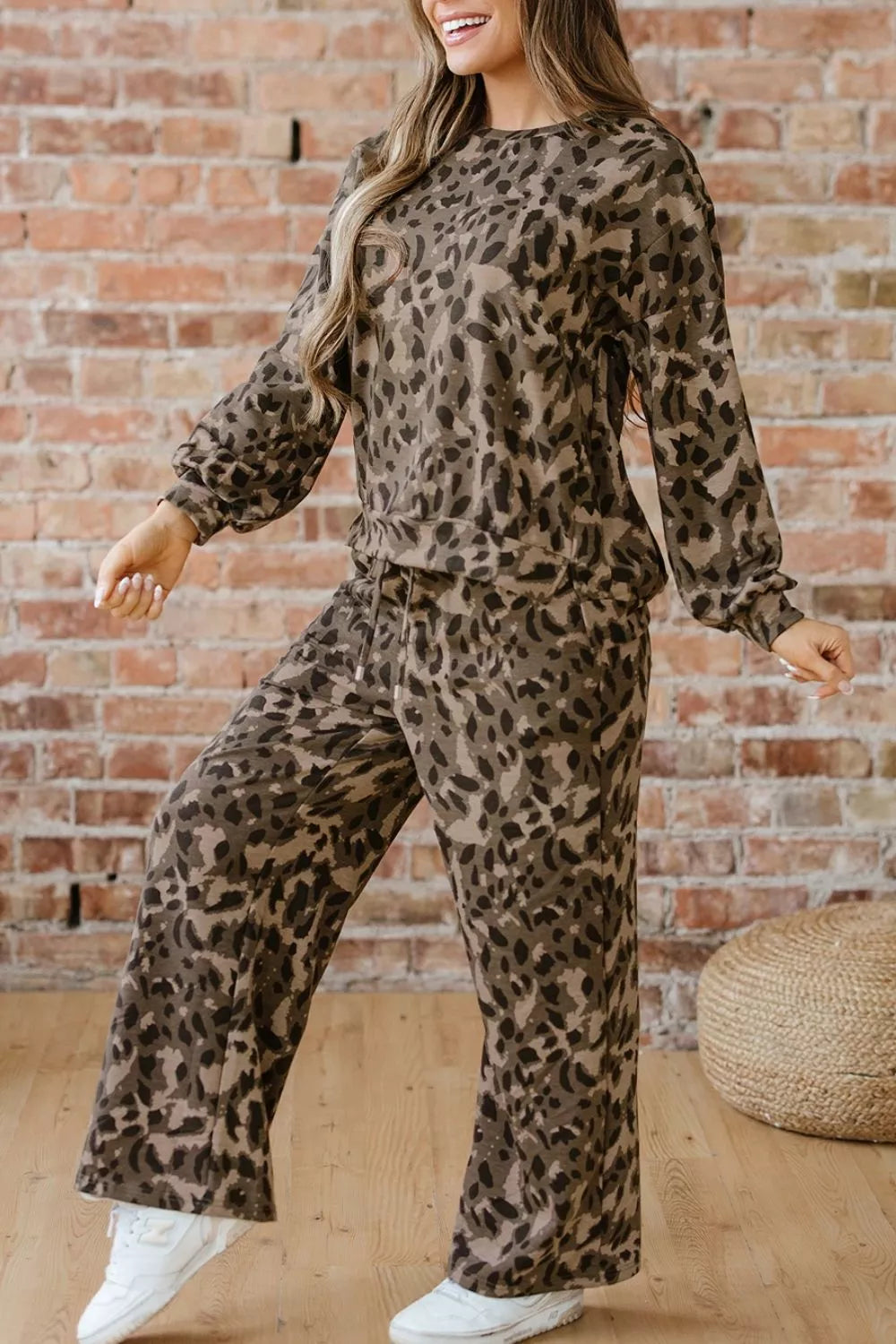 Leopard print long sleeve top and pants set by Trendsi, casual matching outfit with stylish animal print fabric.