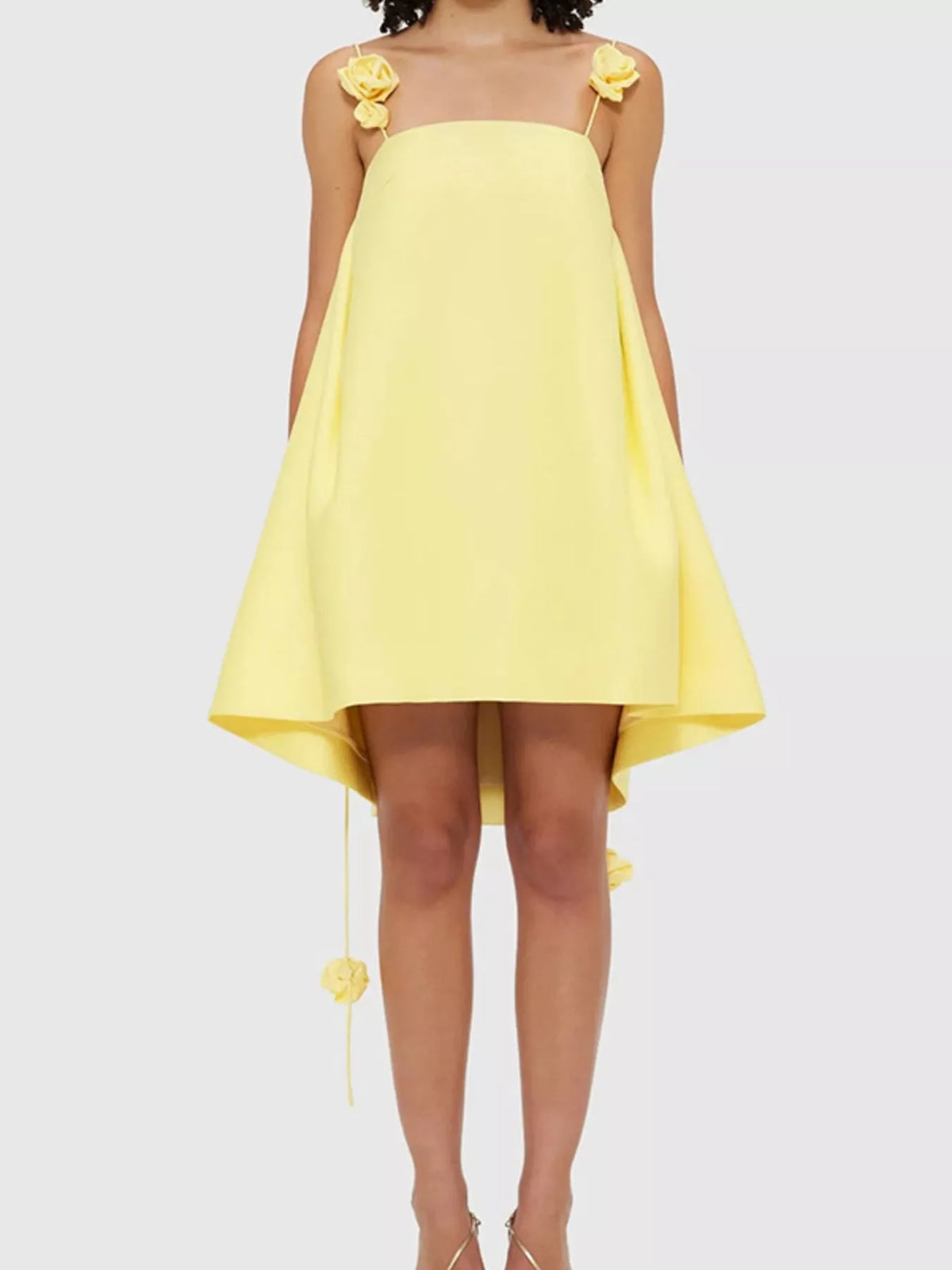 Floral strap mini A-line dress by Plush Fashion Hub with colorful flower patterns and a fitted waist, perfect for summer wear.