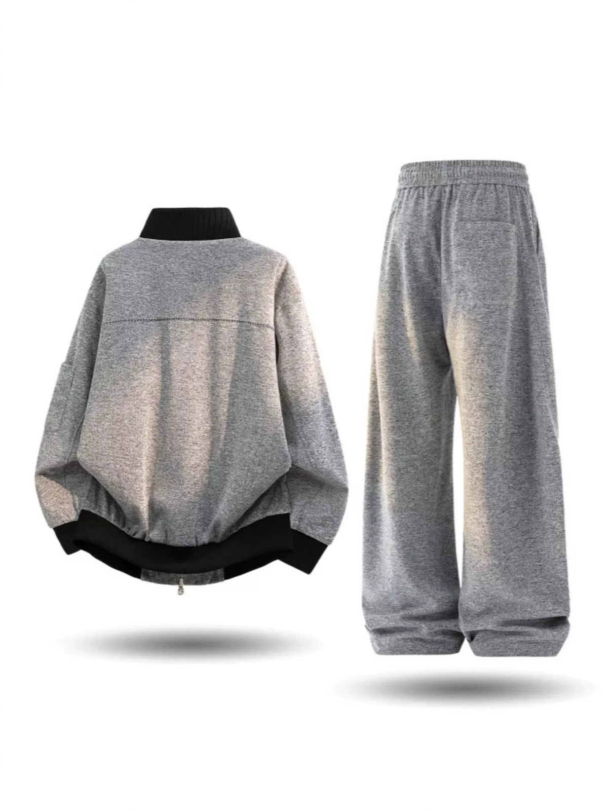Plus size men's thick jacket and pants tracksuit set by Trendsi, featuring cozy fabric and casual athletic style.
