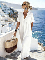 V-neck short-sleeve high waist maxi dress by FitiqueFit, flowing resort-style dress with a relaxed fit and elegant silhouette.