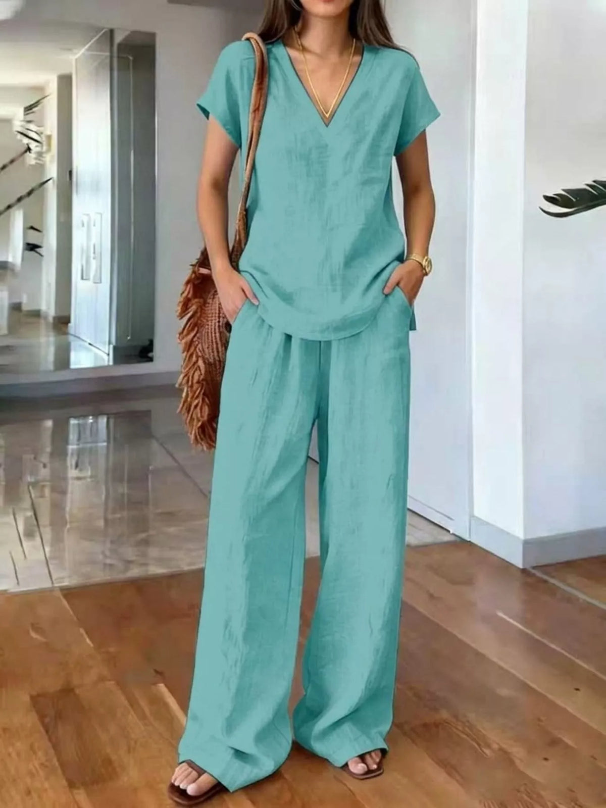 Plus size v-neck short sleeve lounge set with matching pants from Plush Fashion Hub, comfortable loungewear for relaxed wear.