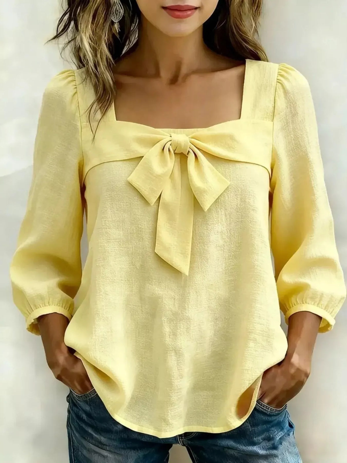 Plus size square neck blouse for women featuring a bow front, stylish top from Trendsi with a flattering fit and full size options.