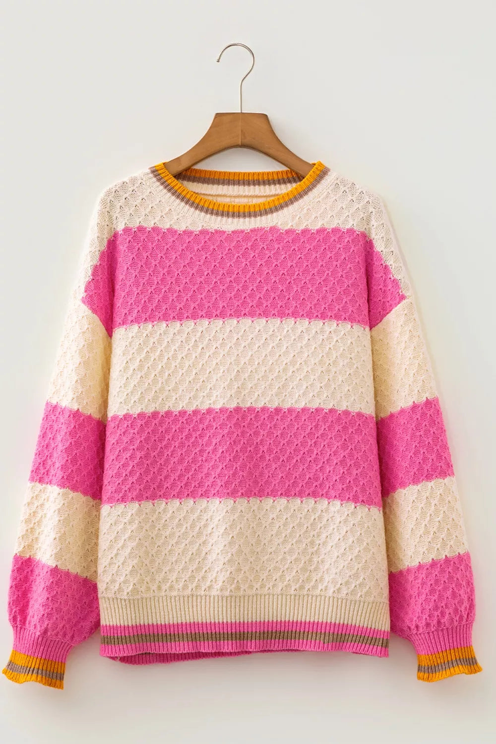 Women's striped colorblock textured drop shoulder sweater by Trendsi, featuring knit fabric and relaxed fit.