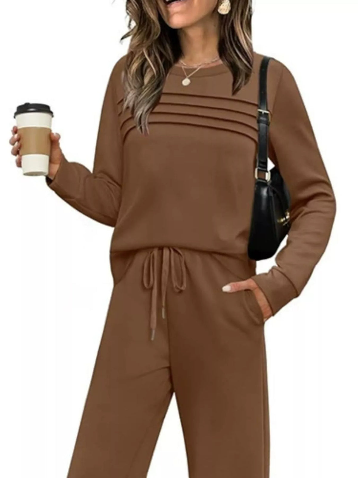 Plus size casual long sleeve crewneck top and drawstring pants set by Trendsi, comfortable loungewear in soft fabric.