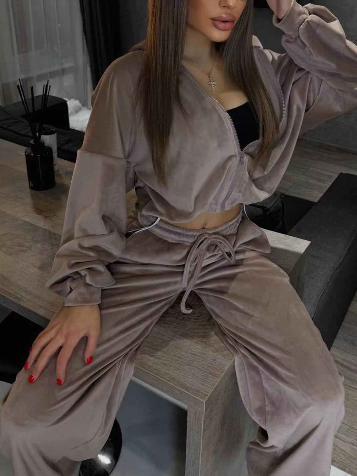 Plush Fashion Hub zip-up cropped outerwear and pants set, featuring a stylish matching top and high-waisted pants in a coordinated design.