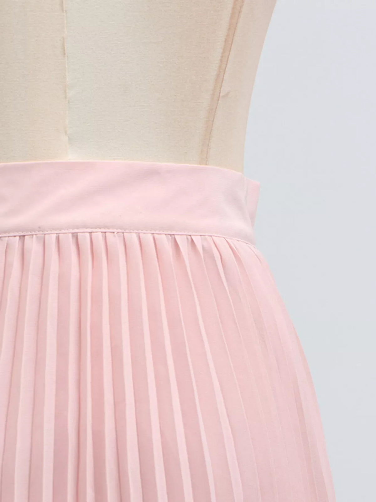 Plush Fashion Hub two-piece set featuring a frill lapel collar top and pleated skirt in a stylish, coordinated ensemble.