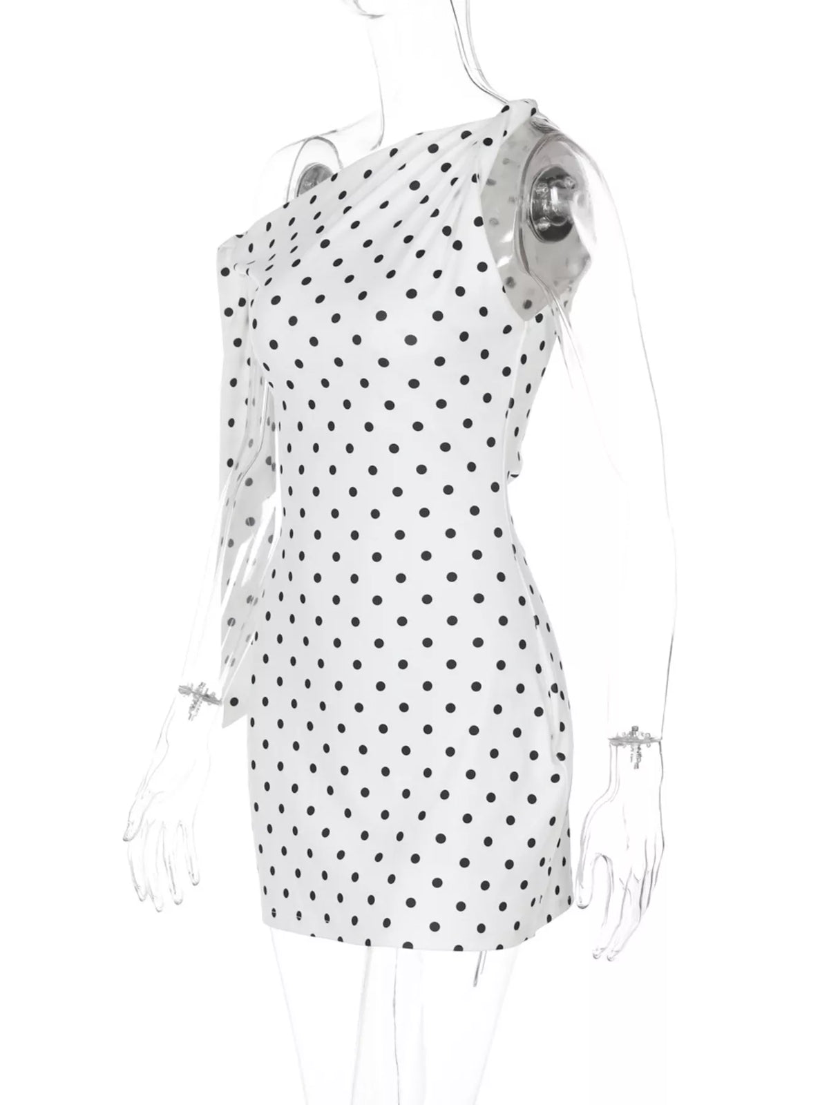 Polka dot sleeveless mini dress with bow accents from Plush Fashion Hub, featuring a playful and stylish design.