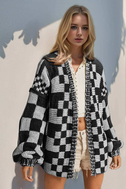 Full size open front checkered drop shoulder cardigan in black and white.