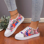 Women's low top floral canvas shoes by Trendy Attic Store01, breathable design with colorful floral pattern on lightweight footwear.