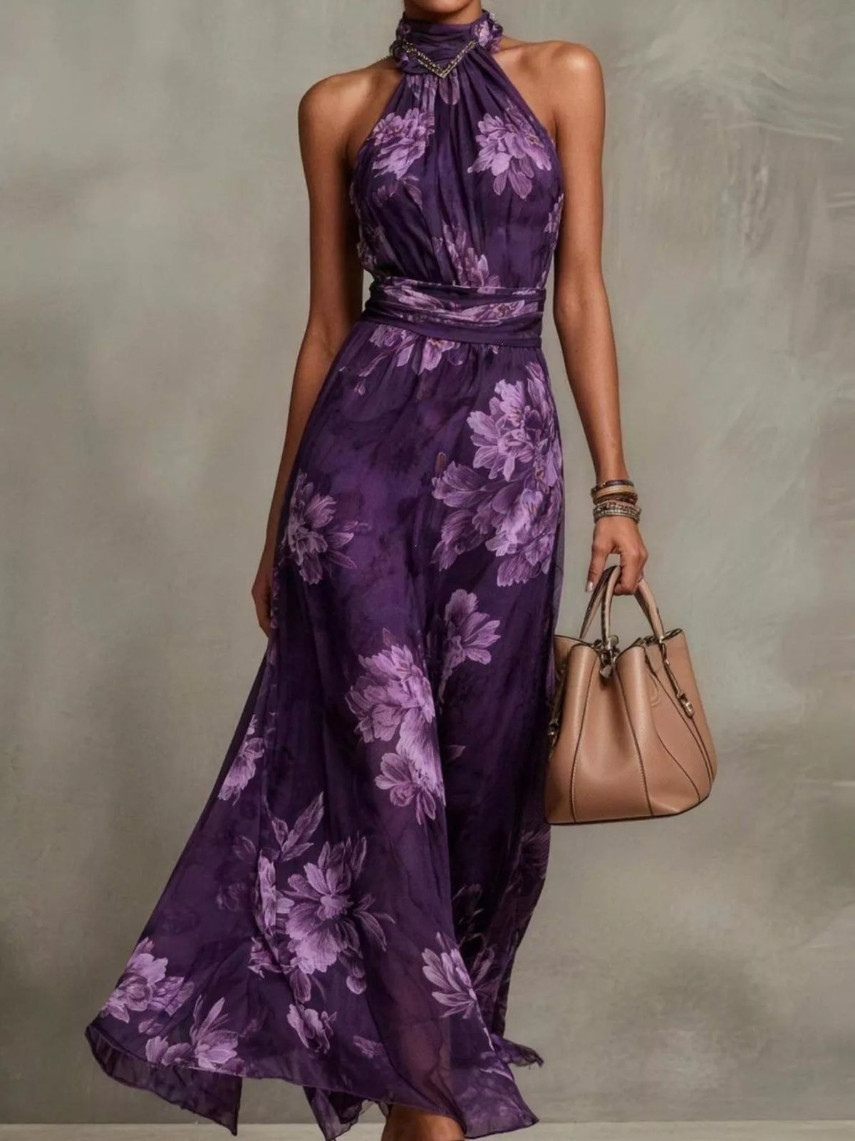 Plus size floral print sleeveless maxi dress by Trendsi, featuring a flowing full-length design with vibrant floral patterns.
