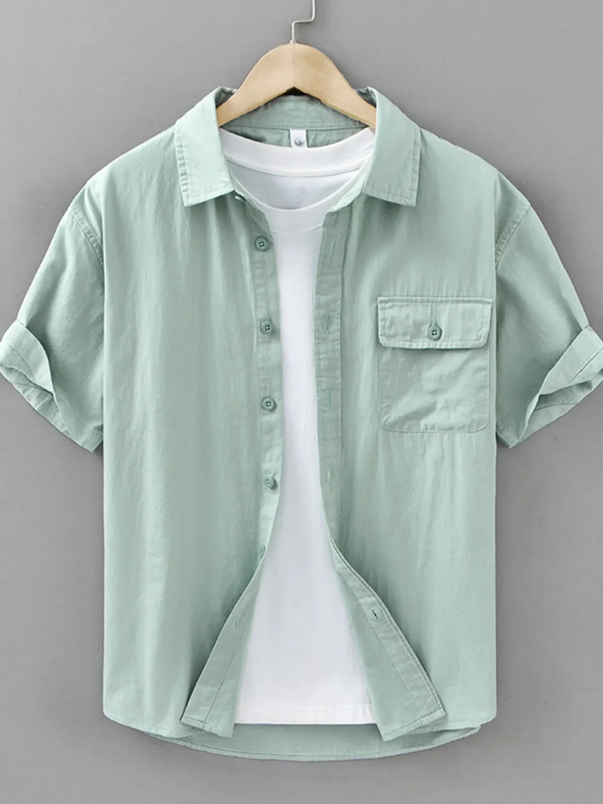 Men's plus size short sleeve button-up shirt from Plush Fashion Hub, shown in a casual and comfortable fit.