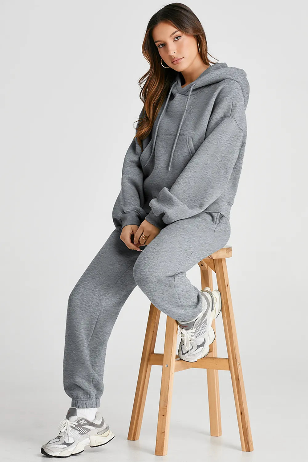Plush Fashion Hub dropped shoulder hooded top and matching activewear pants set, casual athletic outfit with relaxed fit.