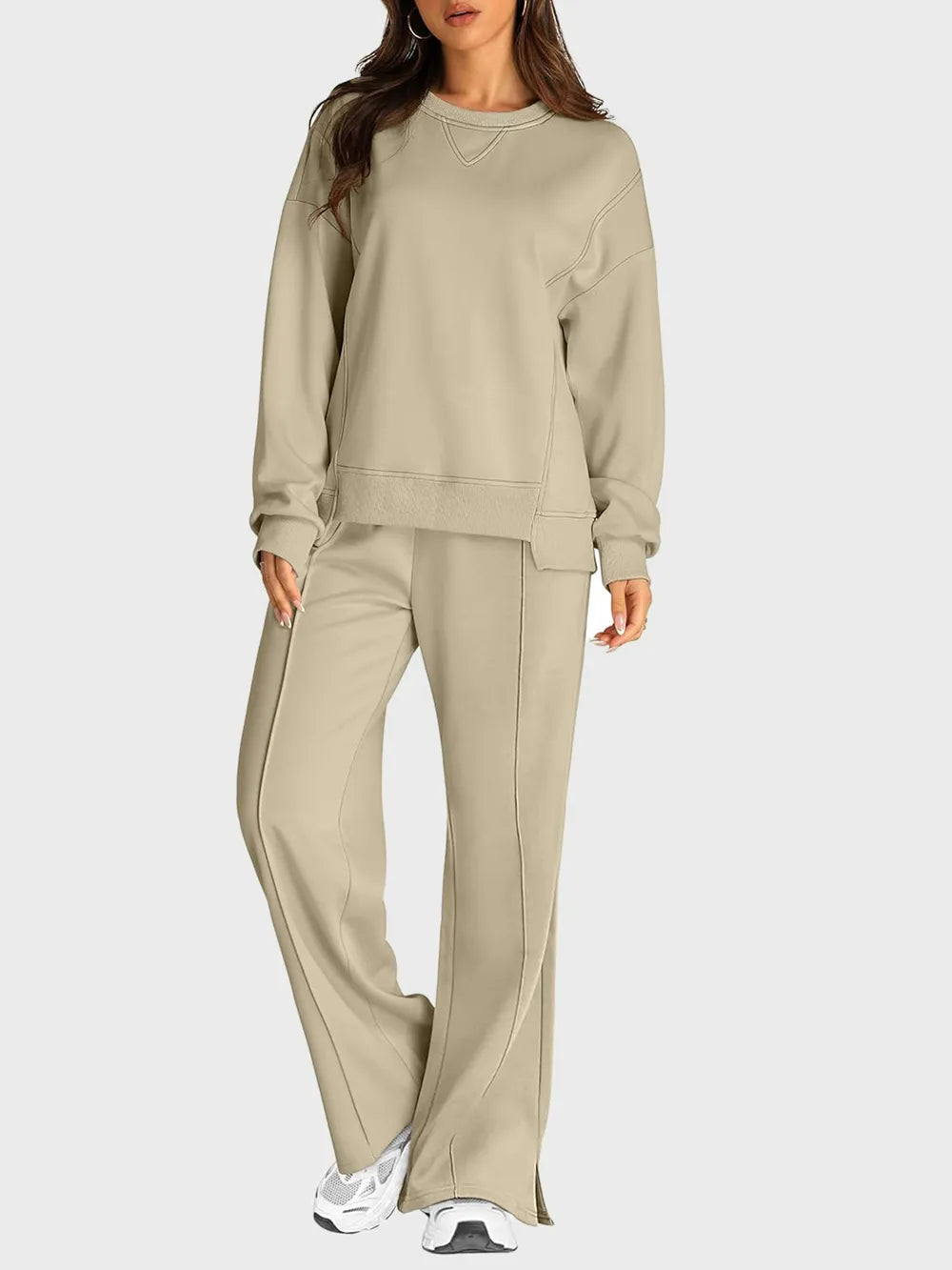 Trendsi round neck long sleeve top and slit pants set, casual stylish outfit, shown in black with comfortable fit.
