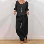 Women’s multi-color two-piece casualwear set with V-neck top and matching pants by Plush Fashion Hub, styled for relaxed comfort.