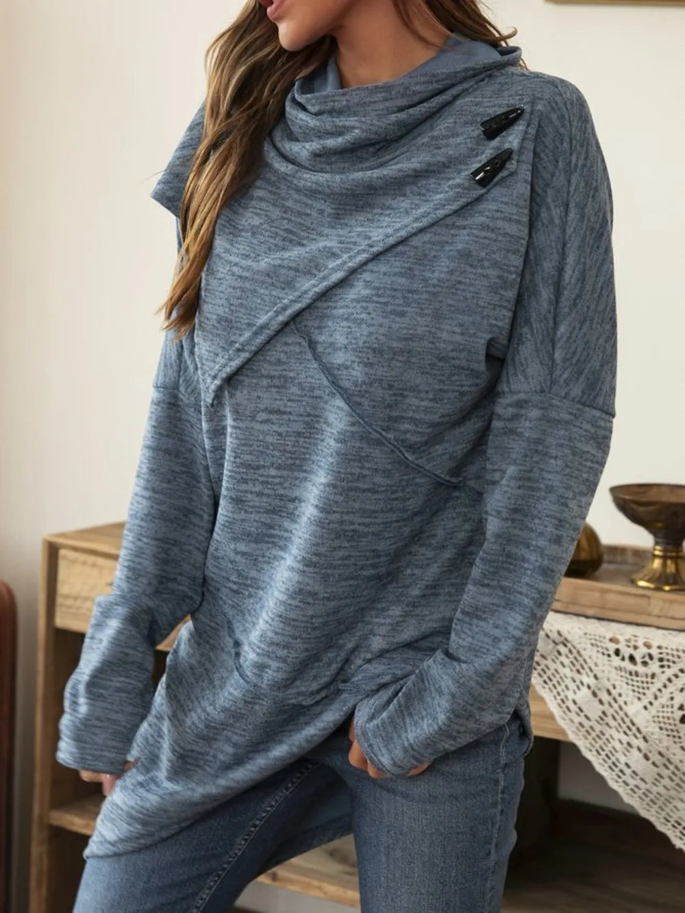 Long sleeve cowl neck t-shirt with asymmetrical hem from Plush Fashion Hub, featuring a stylish draped neckline and modern design.