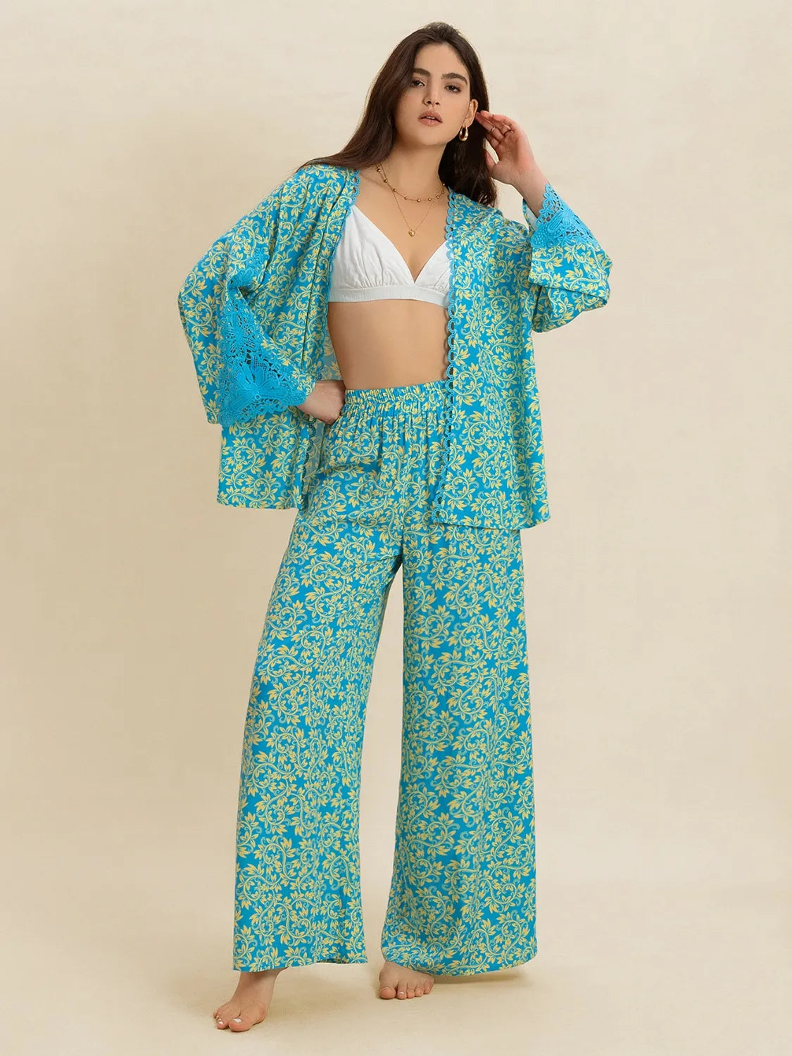 Open front printed matching top and pants set by Plush Fashion Hub, featuring a stylish coordinated outfit with vibrant patterns.
