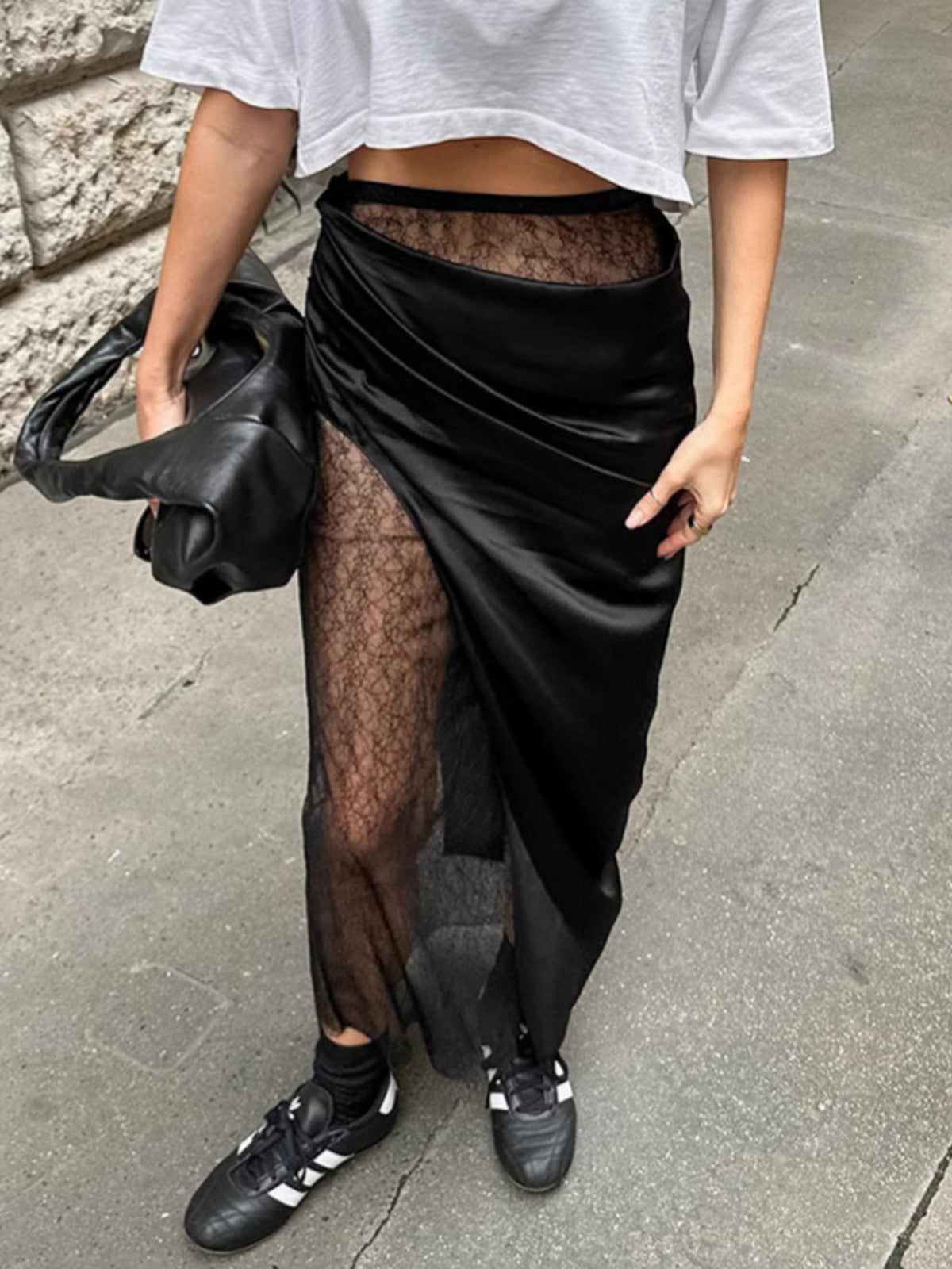 Elegant women’s lace midi skirt with sheer split detail, featuring a feminine design from Plush Fashion Hub.