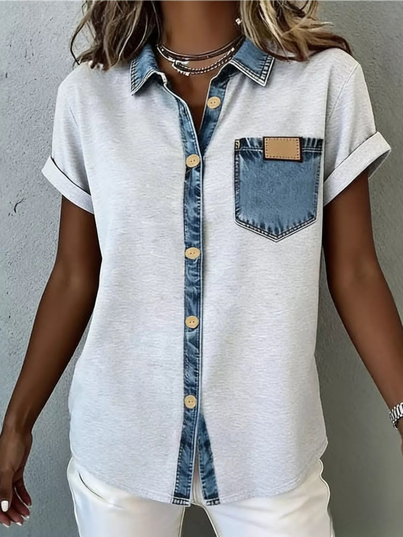 Denim trim short sleeve shirt from Trendsi featuring a casual fit, button front, and classic top style with denim accents.
