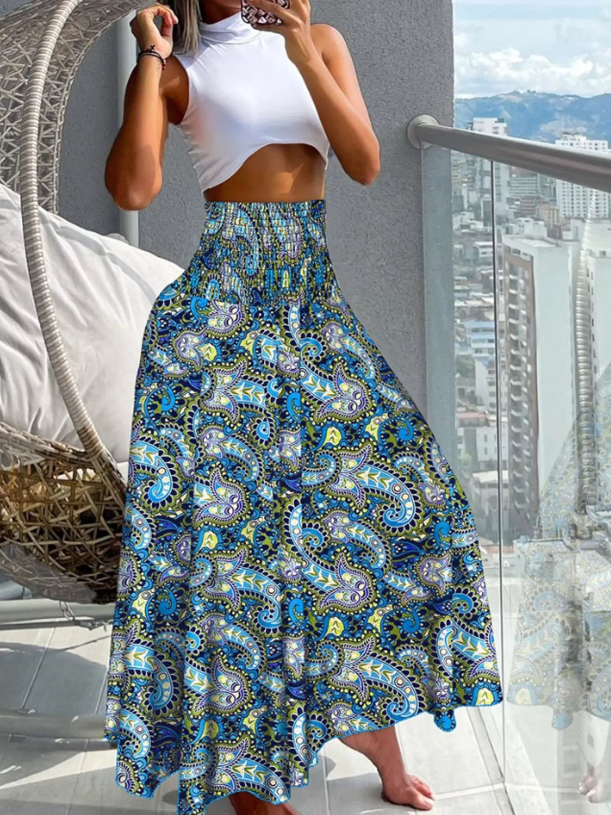 Printed wide-leg pants by Plush Fashion Hub featuring colorful floral pattern and flowing fit, ideal for casual or chic outfits.