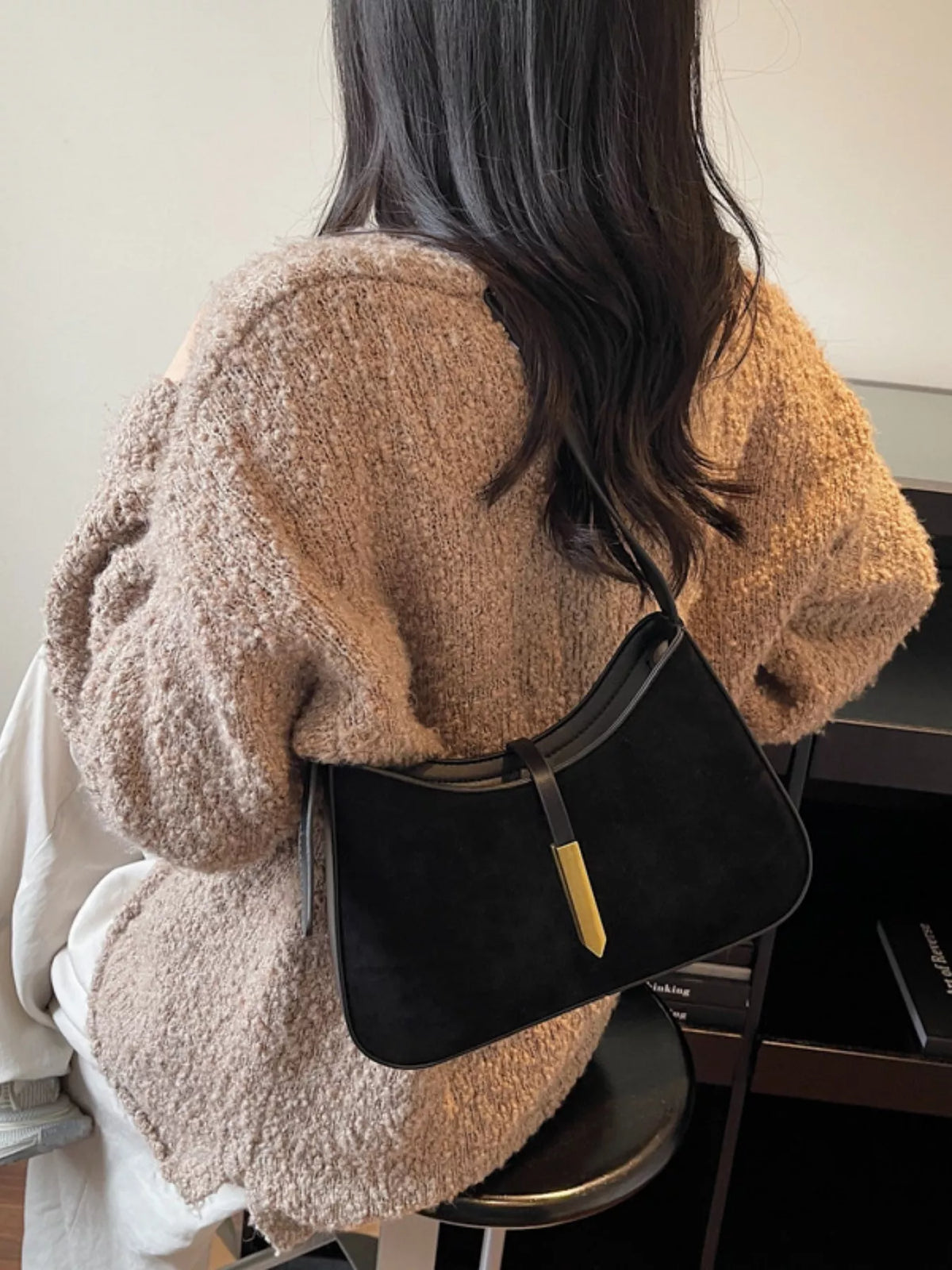 Simply Love adjustable strap shoulder bag with a sleek design, featuring a spacious interior and stylish shoulder strap.