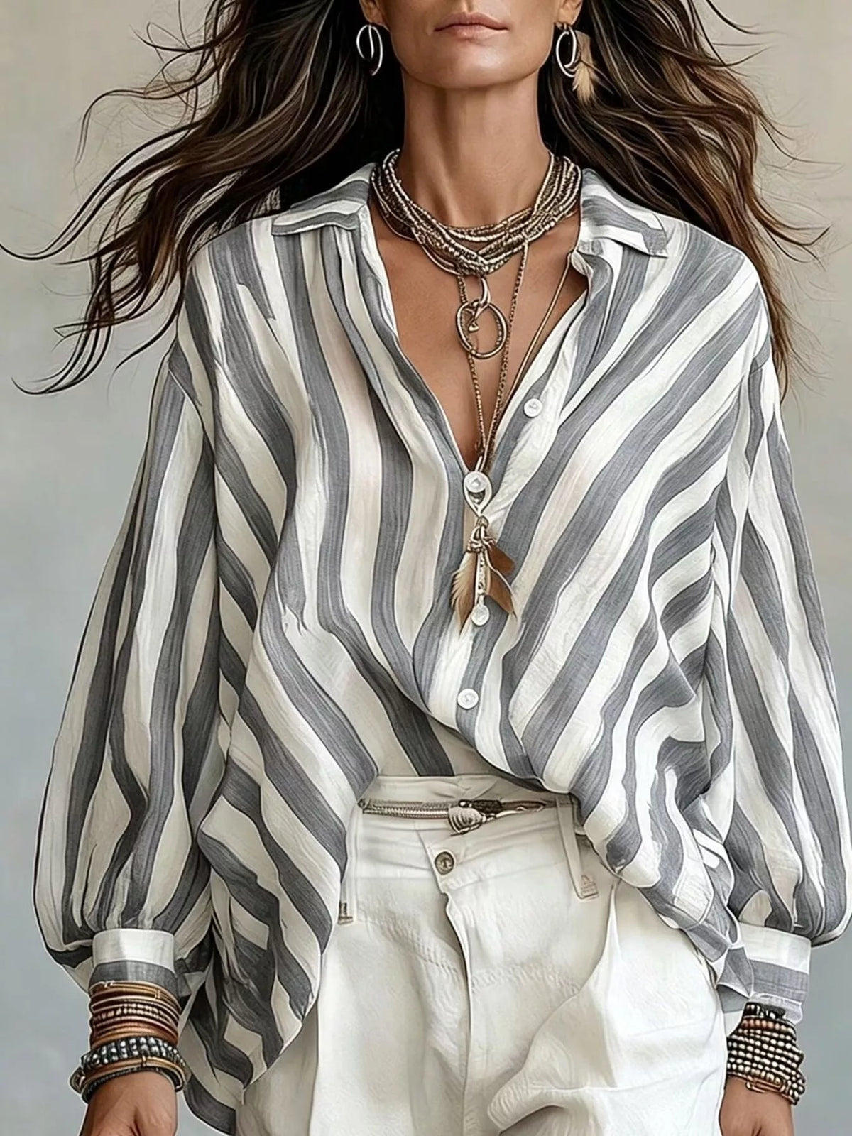 Women’s loose fit striped shirt by Trendsi featuring a relaxed style and soft fabric with vertical stripe pattern.