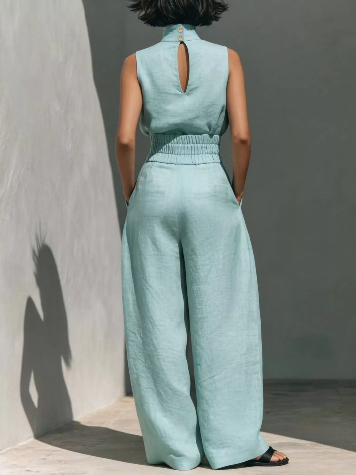 Plush Fashion Hub sleeveless turtleneck top and wide-leg pants set in soft plush fabric, shown on a model.