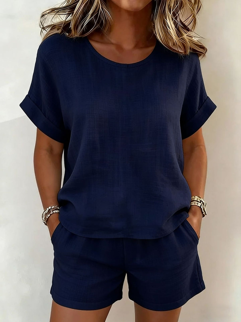 Casualwear cotton linen solid-color T-shirt and shorts set by FitiqueFit in various colors, displayed on a hanger.