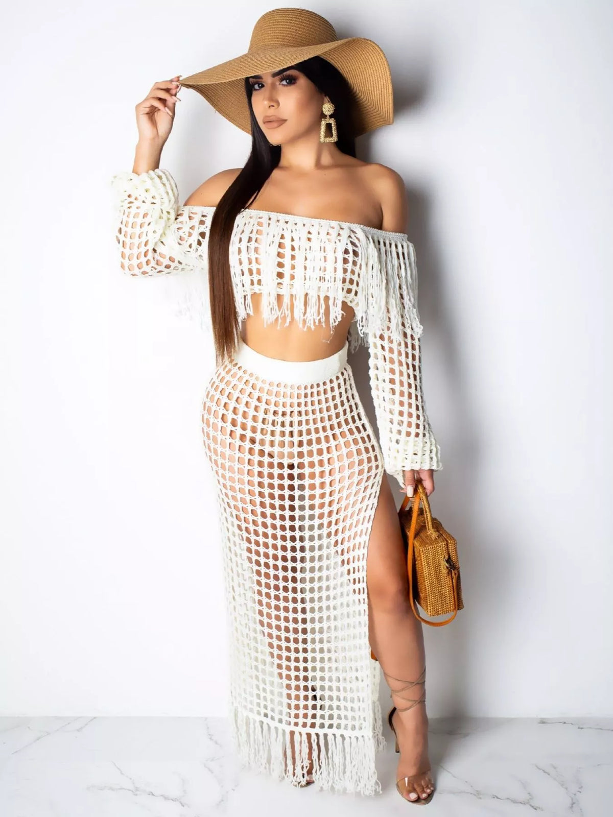 Plus size crochet off-shoulder fringe top and skirt set by Plush Fashion Hub, featuring a stylish matching crochet outfit.
