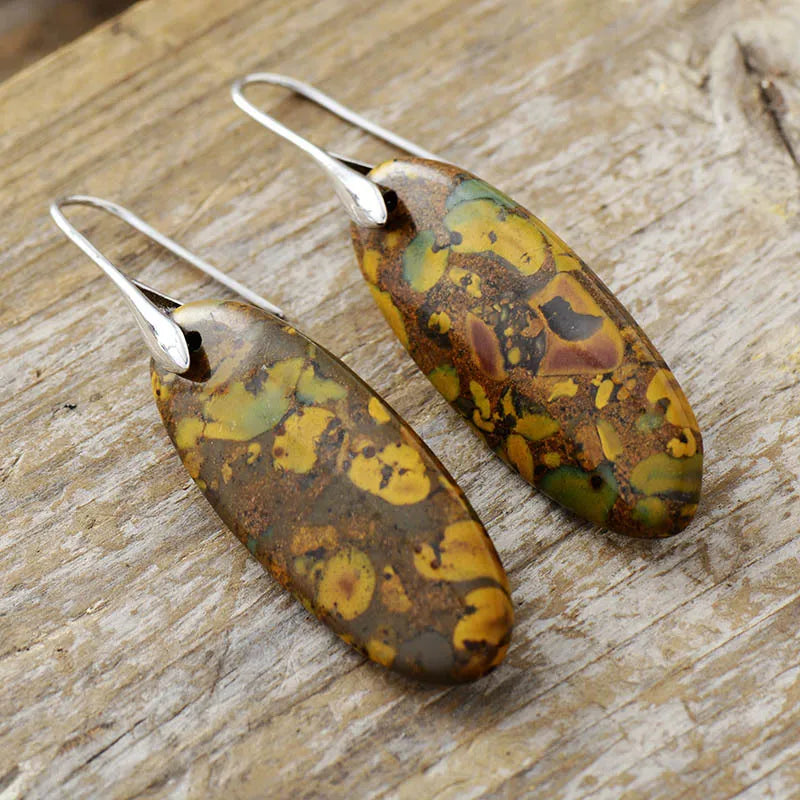 Natural stone copper dangle earrings with intricate designs, featuring earthy tones and handcrafted details from Plush Fashion Hub.