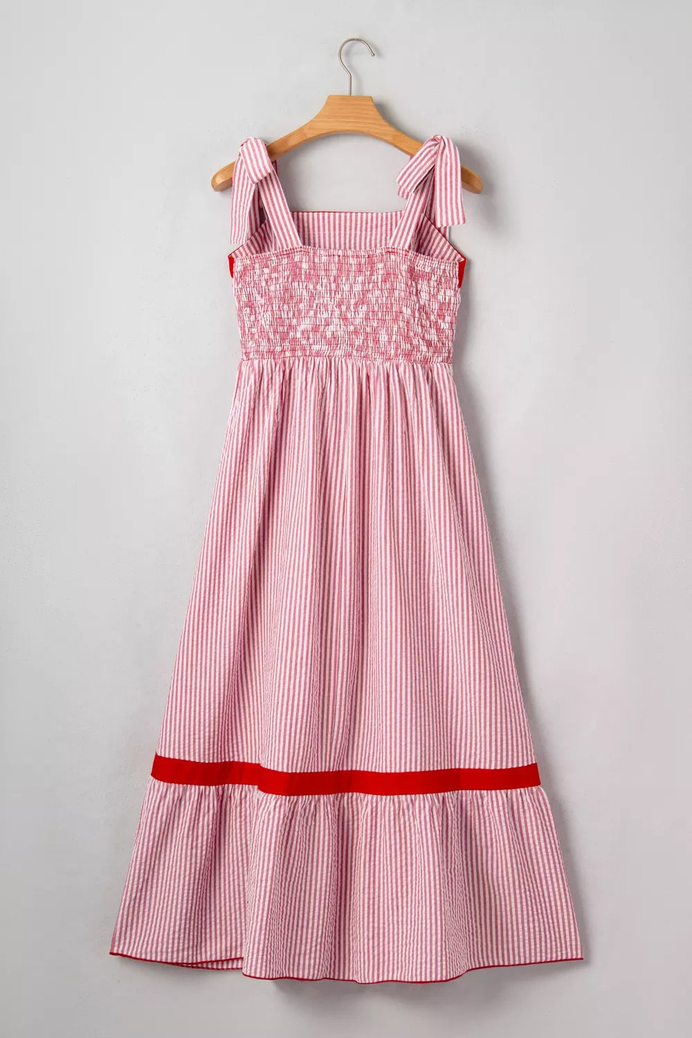 Plush Fashion Hub stripe bow knot straps high waist maxi dress with contrast trim and ruffle hem, perfect for elegant summer wear.
