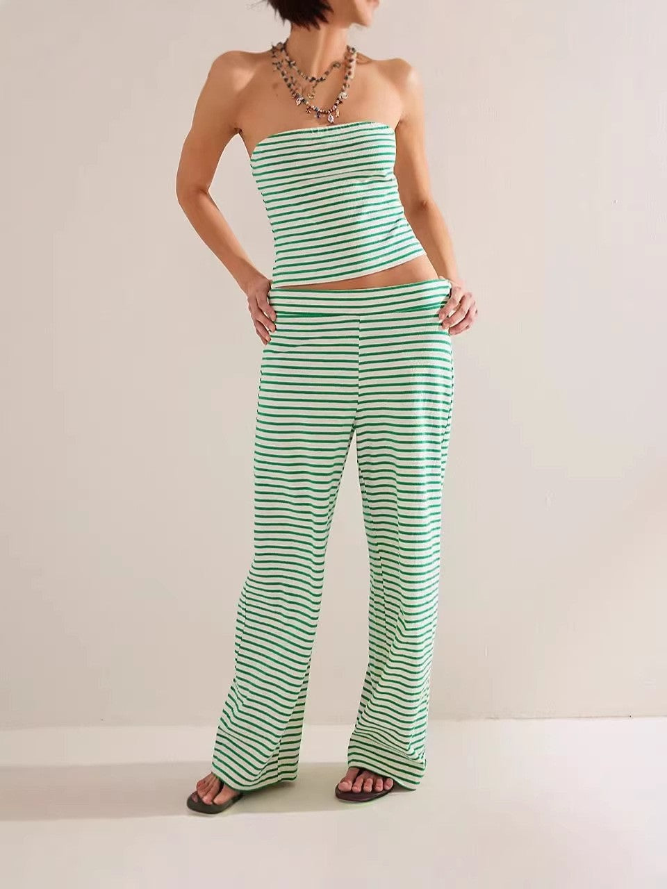 Women's striped tube top and matching pants set by FitiqueFit, casualwear two-piece modal outfit on a model.