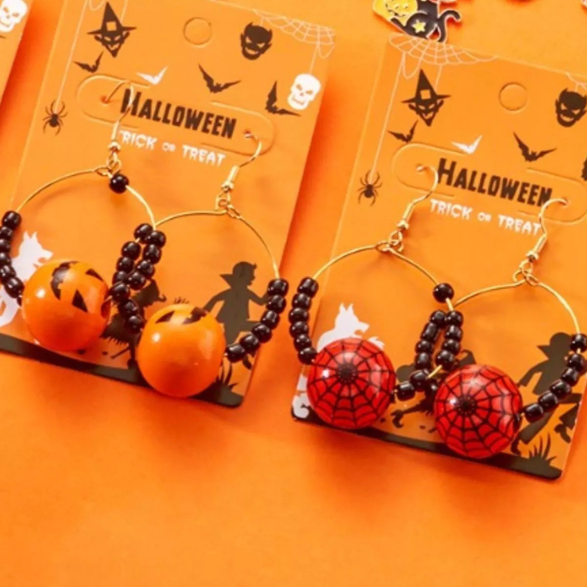 Gold-plated Halloween bead earrings from Plush Fashion Hub featuring festive seasonal bead designs for stylish holiday wear.