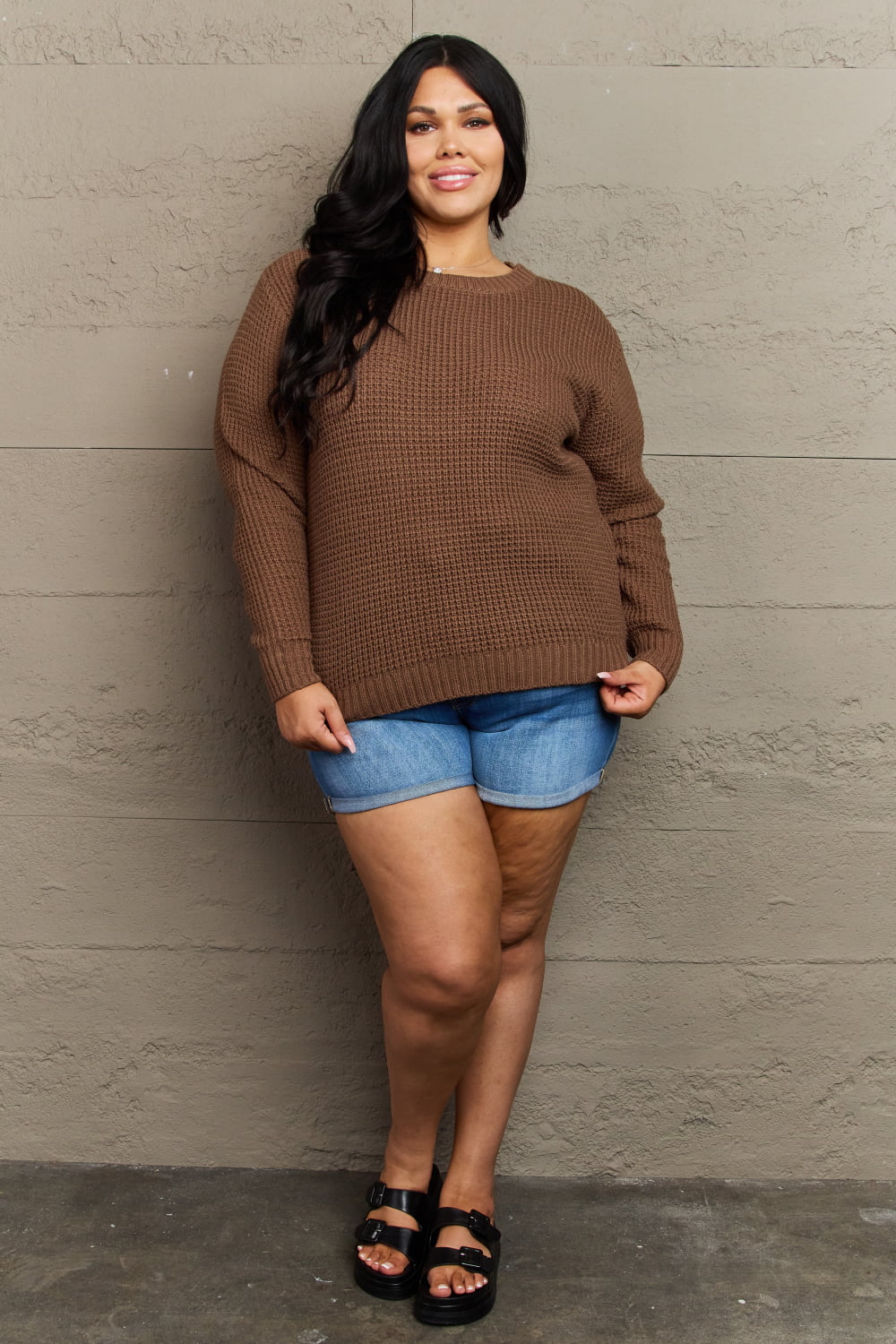 Plus size Zenana waffle knit sweater with high-low hem, breezy and comfortable for casual wear, by Trendsi.