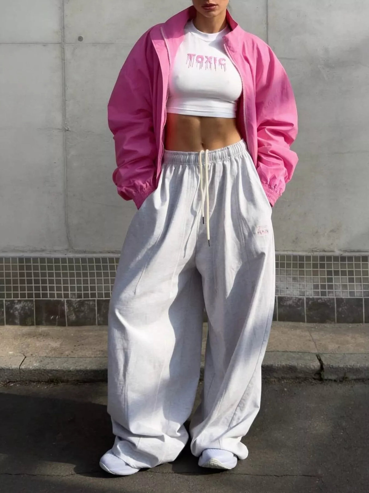 Women's oversized bomber jacket with zip-up front from Trendsi, featuring a stylish and comfortable design.