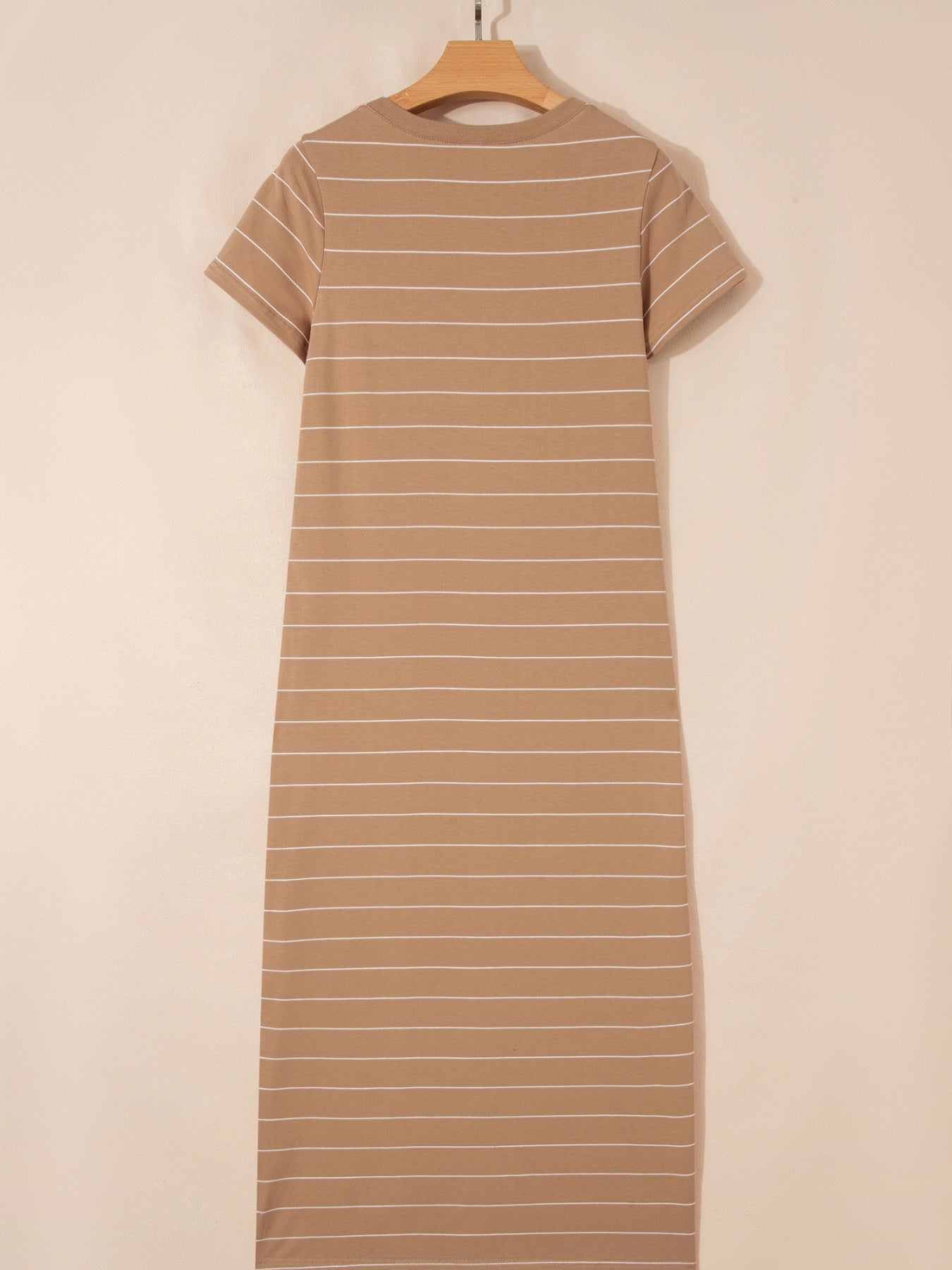 Women's striped short sleeve maxi T-shirt dress with side slit, casual and comfortable Trendsi dress shown on a model.