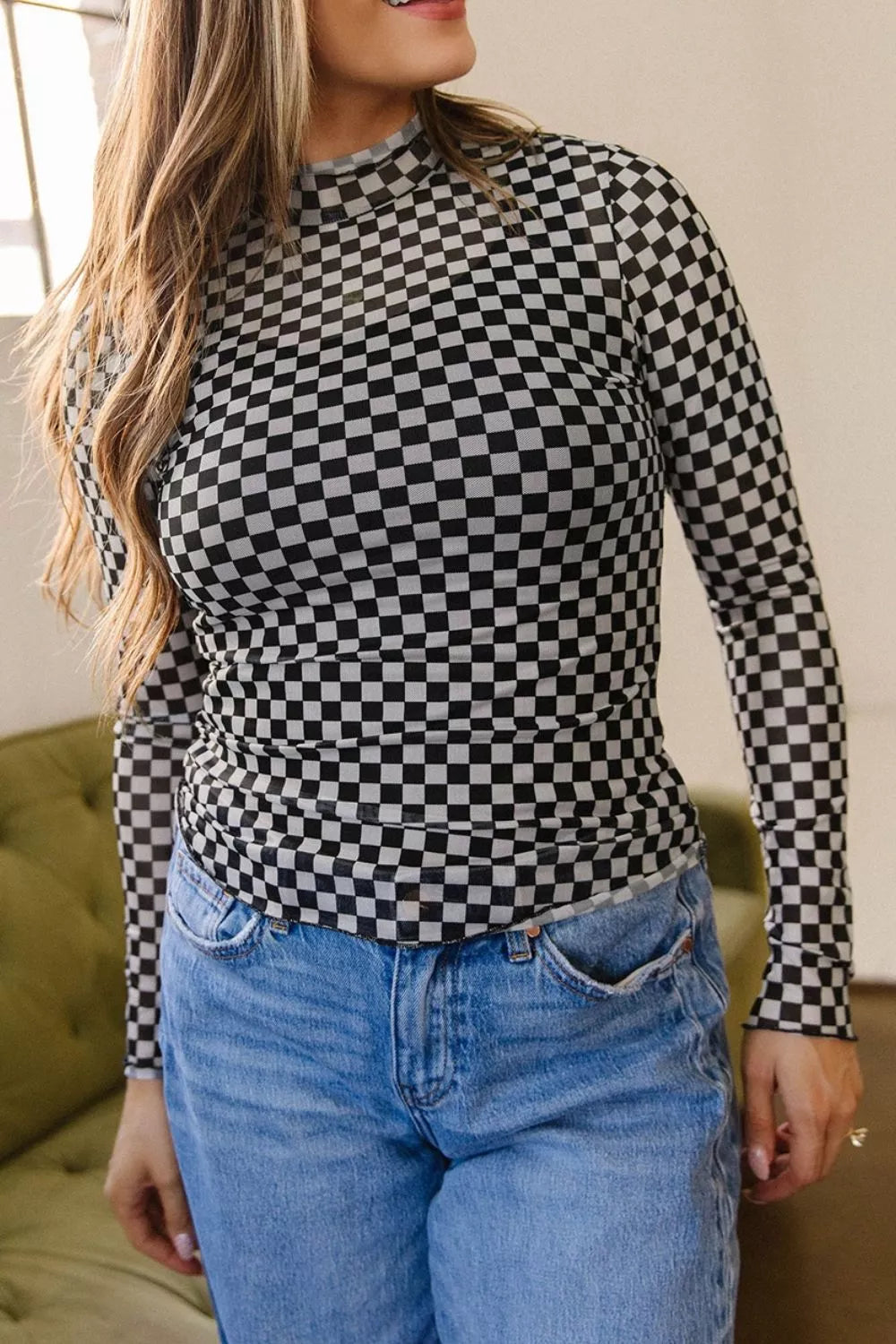 Plaid stand-neck long sleeve mesh top by Plush Fashion Hub, featuring a stylish mesh fabric and button-up design.