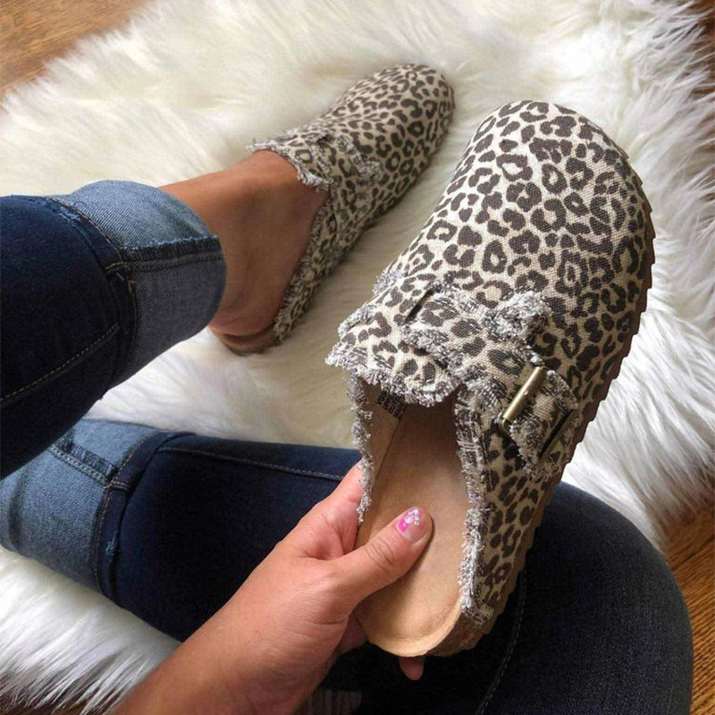 Leopard print LadyShow.Store slip-on shoes with half-support design, featuring a stylish peasant-inspired look and comfortable fit.