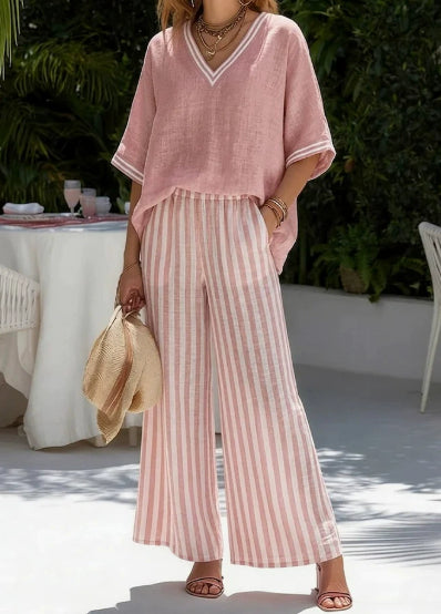 Women's striped tunic top and casual trousers two-piece set by FitiqueFit, featuring a stylish, comfortable casualwear ensemble.