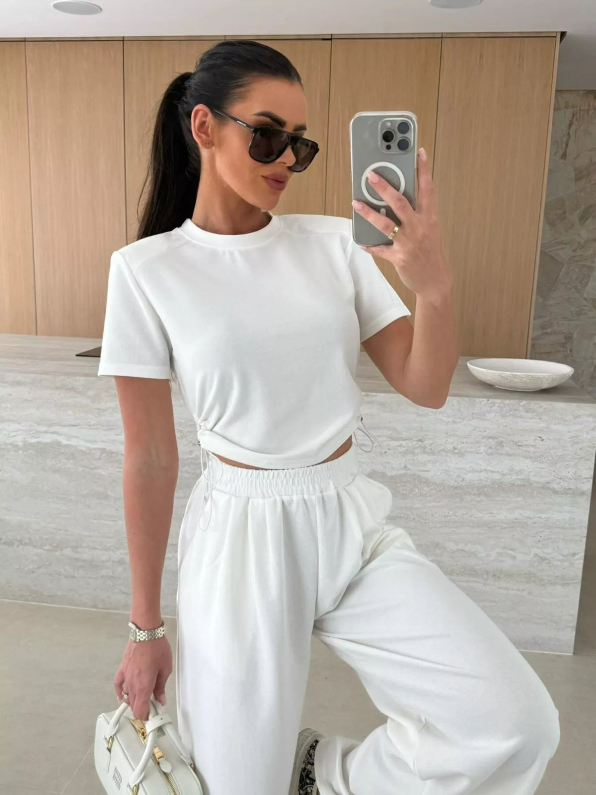 Drawstring crop top and wide-leg pants set by Plush Fashion Hub, featuring a stylish and comfortable matching outfit.