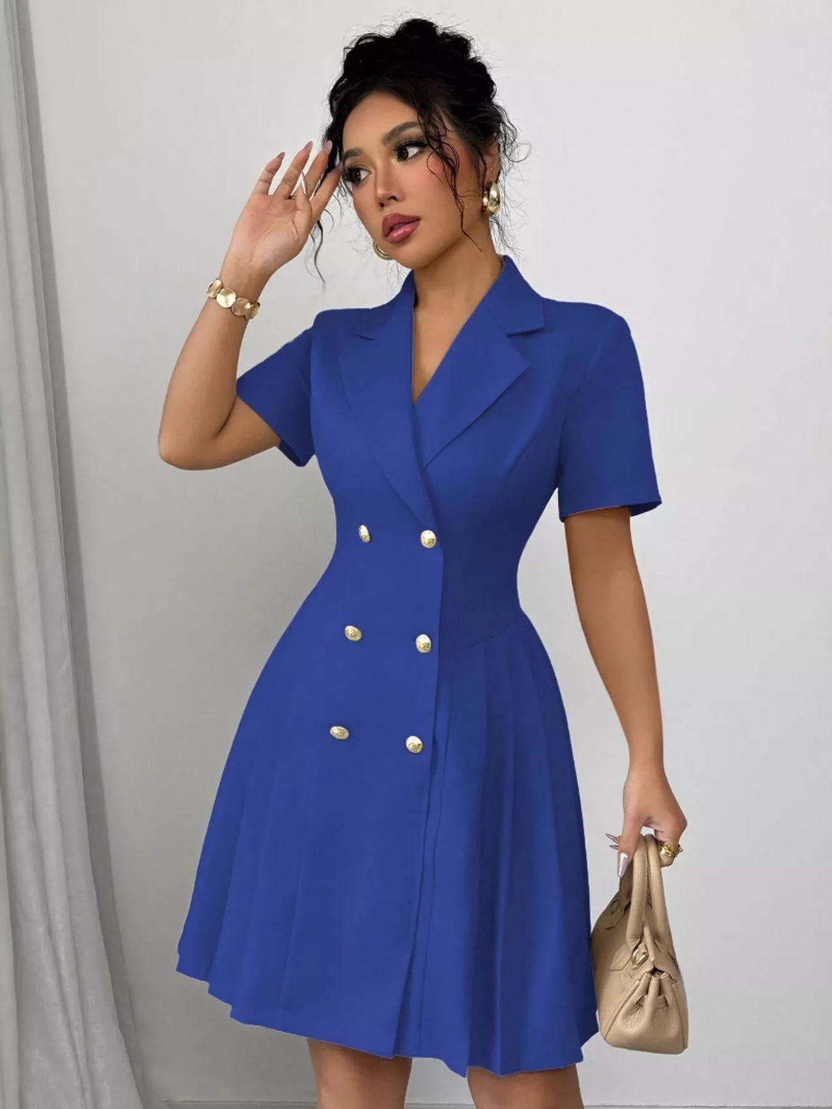 Plush Fashion Hub double-breasted pleated blazer dress with structured fit, featuring a tailored collar and classic button details.