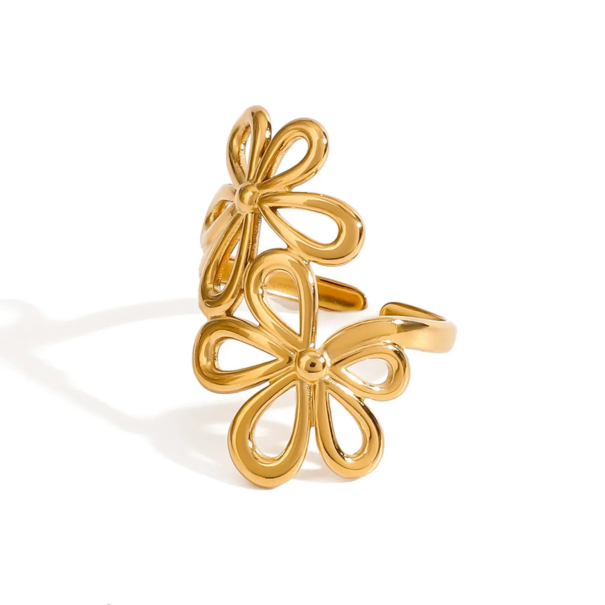 Stainless steel flower ring from Plush Fashion Hub featuring a detailed floral design on a sleek band.