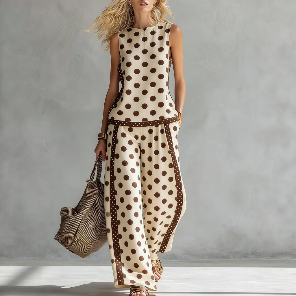 Women's sleeveless printed tank top and wide-leg pants two-piece casualwear set by Plush Fashion Hub, featuring colorful print and relaxed fit.