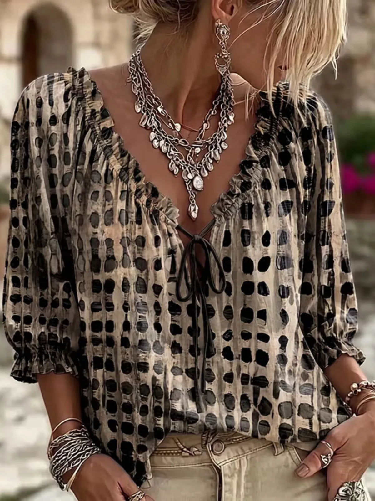 Plus size tie neck blouse with 3/4 sleeves from Trendsi, featuring a full-size fit and stylish design.