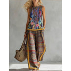 Printed retro sleeveless top and wide-leg pants set by FitiqueFit, featuring vibrant patterns in various sizes.